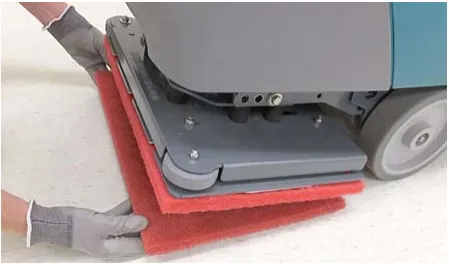 Photo of the work pad being attached to the backer pad