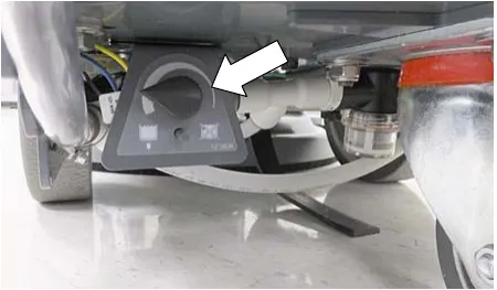 Photo of the solution flow control knob underneath the machine