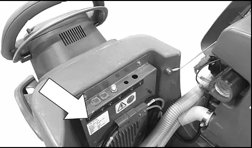 Photo of the rear of the T300e control console with an arrow pointing to the serial number plate