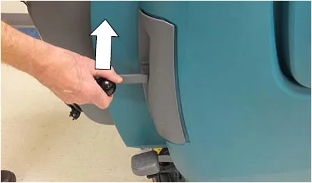 Photo of a hand lifting the down pressure lever