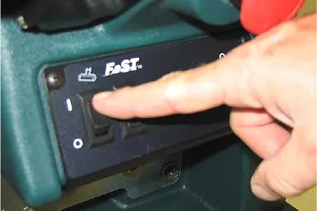 Pressing the off-aisle wand switch to the on position