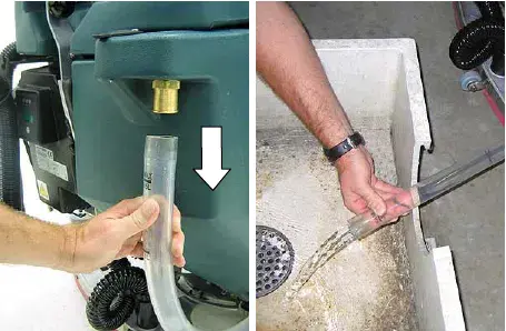Pulling the solution tank level hose off the fitting and draining it into a sink