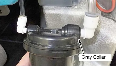 Hose connectors on the cartridge with a gray collar marked