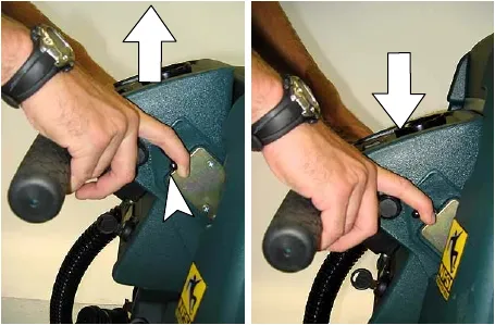 Pulling the console height adjustment lever and lifting or lowering the control console