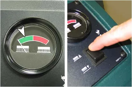 Brush pressure meter with the needle in the green zone, and the brush pressure switch