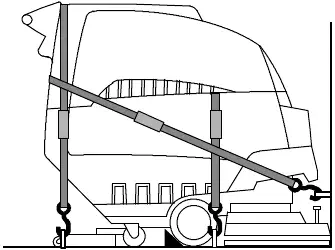 Side view of the machine secured to a trailer floor with tie-down straps