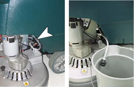 Black connector fitting at the scrub head marked by an arrow, and the hose placed into a bucket