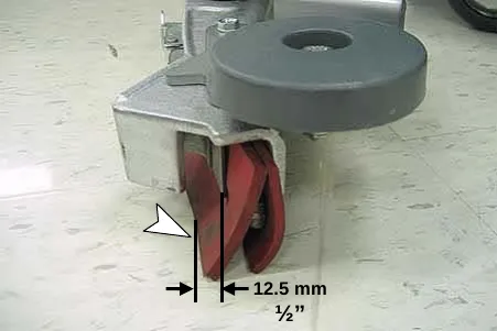 Squeegee blade deflection of 1/2 in (12.5 mm) shown at the rear blade