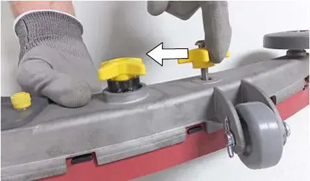 Squeegee frame and blade retainer squeezed together while an outside knob is re-tightened