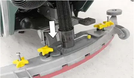 Vacuum hose connecting to the squeegee assembly, arrow showing the hose port
