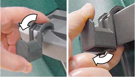 Accessory clip being hooked over the rail and the latch tab being pulled down to release it, arrows showing the motion