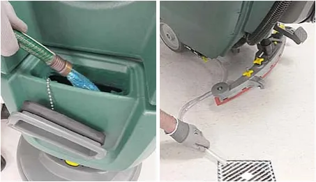 Hose filling the solution tank with clean water, and the solution hose draining over a floor drain