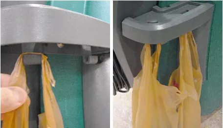 Debris bags hanging from the J-hooks under the right side rail