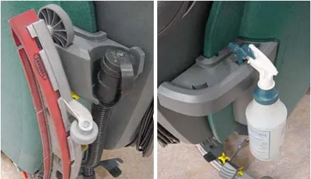 Accessory rail holding the squeegee assembly, and a spray bottle on the rail