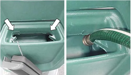Two hose clips at the solution tank fill-port, arrows pointing at each clip, and a hose held in a clip