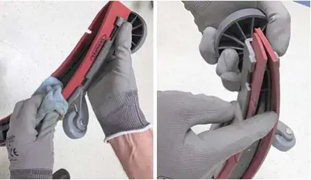 Squeegee blade being wiped with a cloth and the blade being rotated