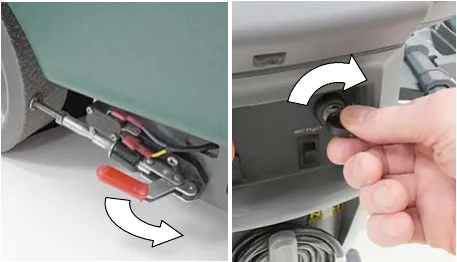 Parking brake lever being released near the rear wheel, and the key being turned to the on position