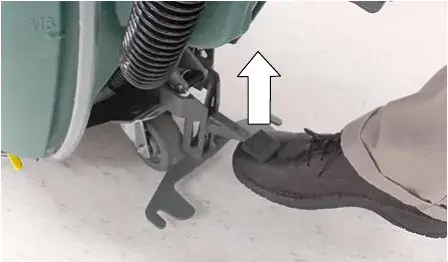 Foot lifting the squeegee mount bracket by the pedal, arrow showing upward lift