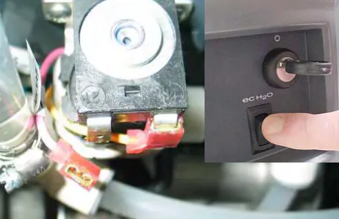 The water valve with its wire connectors, and the ec-H2O switch on the console being pressed to turn it off