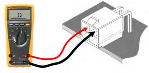 Multimeter set to ohms with probes on the two CAN pins of a connector