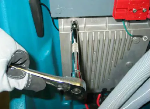 Removing a heat sink mounting bolt with a ratchet wrench
