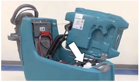 Recovery tank lifted to show the ec-H2O water conditioning cartridge, with an arrow pointing to it