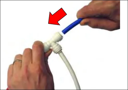 Pushing blue tube into a push-to-connect fitting, with a red arrow showing the direction