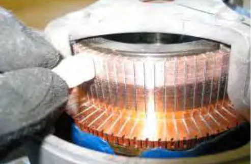 Cleaning the commutator with a stone