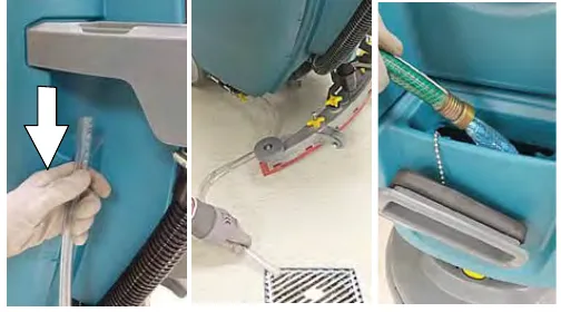 Draining the solution tank with the drain hose and rinsing the tank