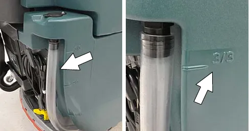 Solution tank drain hose with the 3/3 level mark