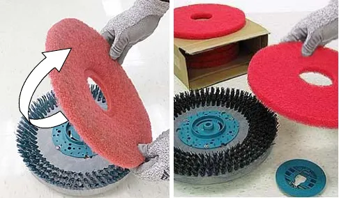 Turning a red pad over on the disk brush and a box of replacement pads