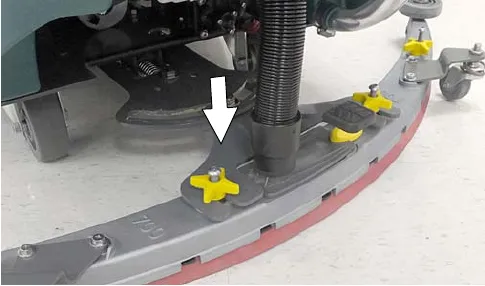 Vacuum hose connected to the squeegee assembly, arrow pointing down