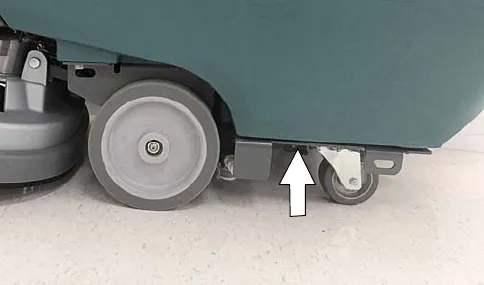 Jacking location under the frame beside the rear wheel marked by an arrow