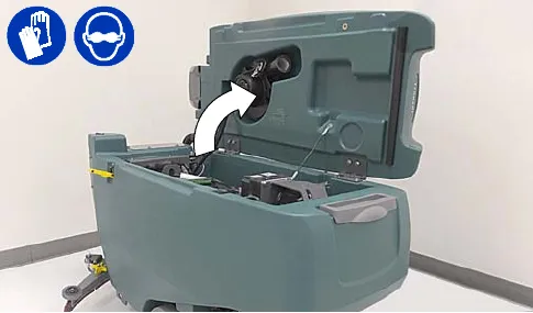 Recovery tank lifted to open the battery compartment, with protective gloves and eye protection symbols