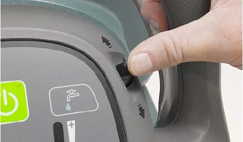 Thumb pushing the directional lever forward or pulling it back