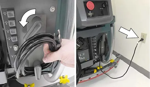 Taking the charger cord off the storage hooks and plugging it into a wall outlet