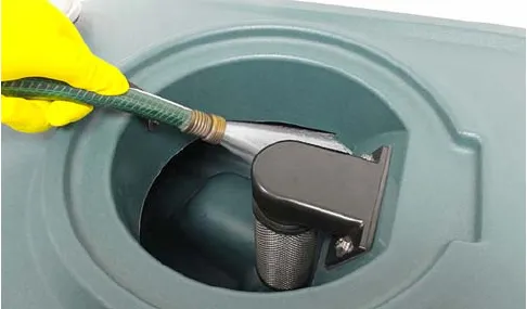 Rinsing out the recovery tank with a hose