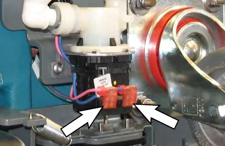Arrows pointing to the wire harness connector on the water solenoid valve