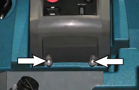 Arrows pointing to the two button screws holding the lower console cover