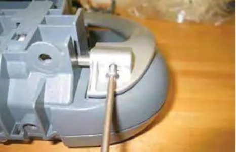Bail handle being removed from the bottom control housing