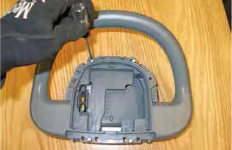 Operator console turned over to show the front self tap screws