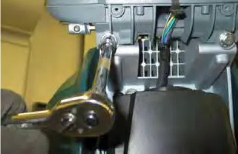 Pan screws holding the operator console to the machine