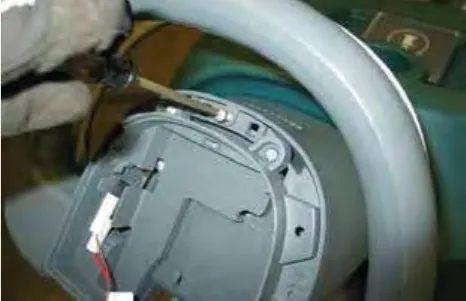 Console cover being lifted off the operator console