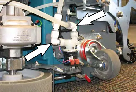 Arrows pointing to the hose connections on the water solenoid valve
