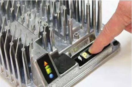 Finger pressing the Select Charge Profile button on the charger
