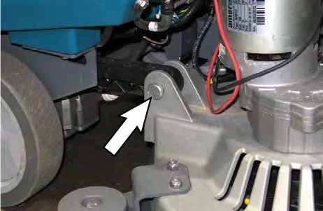 Arrow pointing to the head lift arm clevis pin