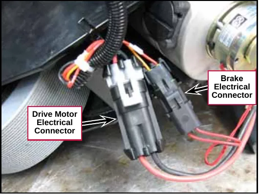 Photo of the lower drive motor electrical connector and the brake electrical connector below the drive wheel motor