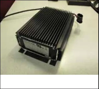 S.P.E. on-board battery charger, a black finned unit
