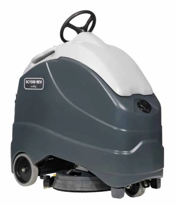Advance SC1500 REV floor scrubber seen from the front left: dark gray body, light gray recovery tank cover, steering wheel on top and the round scrub deck at the bottom