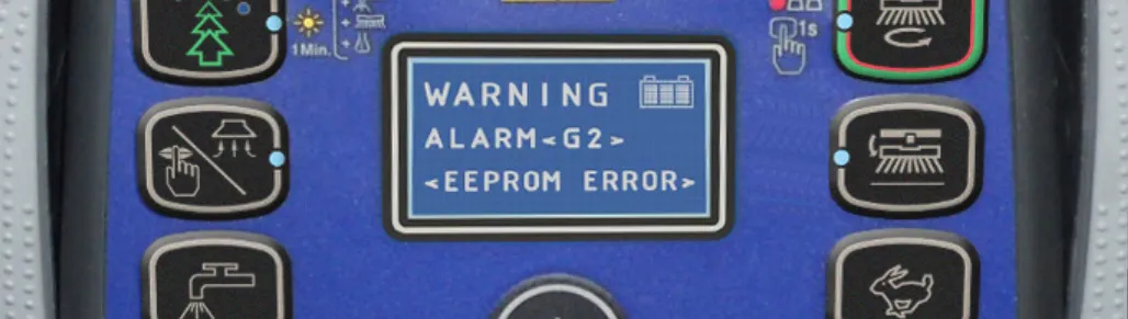Control panel display showing the format of an alarm message: WARNING, ALARM <G2>, <EEPROM ERROR>, with a battery symbol